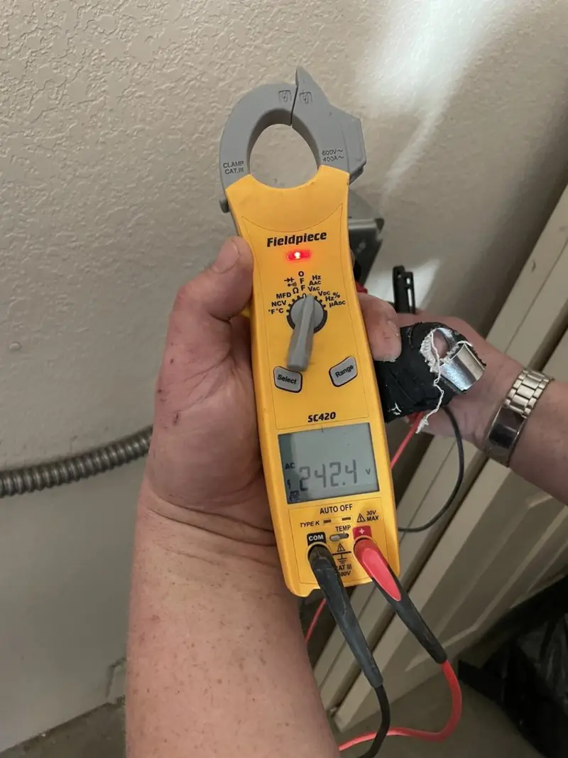 Voltage testing with clamp meter during Generator Installation in Accokeek